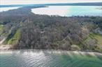 Rare and Remarkable Waterfront Offering on Centre IslandAn extraordinary chance to acquire one of Centre Islands most expansive open waterfront estates. Spanning over 17 acres, this property boasts along, private beach with panoramic views stretching across Oyster Bay. Lloyd Neck, and even Connecticut. One of the largest open waterfront parcels on Centre Island with over 564.83 feet of sandy beach. Currently there are four buildings on the property, a main house, pool house, and garage by, four existing structures rest on the land - three of which were designed by renowned mid-century architectural firm The Architects Collaborative (TAC), founded by Benjamin Thompson and Walter Gropius, offering a unique restoration opportunity and a 2.5 bedroom caretaker&rsquo;s ranch. **All buildings except the caretaker&rsquo;s ranch are in need of a full restoration.** Watch the sunrise over Long Island Sound and the mouth of Oyster Bay from this pristine property. There are many improvements/utilities including public water & electric, dec approved plans for a 200sf boat house. Two ways to access the property from Centre Island Road. Potential for subdivision., Additional information: Appearance:poor