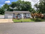 A beautiful expanded large ranch with great curb appeal. This home features an eat in kitchen, formal dining room, living room, 1.5 bathrooms, 3 bedrooms with possible 4th bedroom or additional family room, full basement that is partially finished, updated heating system with separate hot water heater, new roof, one car attached garage, large park-like property and more. Turn this gem into your own with your personal touches.