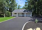 This beautiful 3 bedroom home sits right across from a scenic golf course. Sunlight pours in through skylights throughout the home, creating a bright and inviting atmosphere. Enjoy the convenience of parking in both the front and back of the home. With its open layout and unbeatable location, this home is a perfect place to relax, enjoy and take in the view. Proximity to Stony Brook University/hospital and The Three Village School District make this a true gem.ADITIONAL PARKING AREA .GREAT FOR BOAT OR ADITIONAL CARS.LARGE SHED