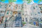 Charming two-family home with endless potential, nestled in the heart of Bushwick. Offering over 2, 000 square feet across three spacious floors, this residence is ready to be customized to suit your lifestyle and needs. A perfect blend of original character and modern updates. The owner&rsquo;s duplex features three bedrooms, two full bathrooms, contemporary kitchens, and a full unfinished basement. This level features a living room, dining room and bedroom with a mix of classic hardwood flooring and sleek white tiles leading to the rear garden. The private outdoor space is framed by tall shrubs and lush green grassâ€”ideal for gardening, barbecues, and entertaining. The second unit, more recently renovated, still maintains its historic charm with preserved moldings and custom finishings. It includes three generously sized bedrooms, a full bathroom, an updated kitchen, and separate living and dining areas. There is also access to the roof from this unit, which has been recently replaced and still under warranty. Enjoy ample sunlight from the skylight and oversized windows. Both units boast soaring 12-foot ceilings, enhancing the spacious feel of this 19-foot-wide property. This level features timeless tin ceilings, adding another touch of vintage appeal. Located on a picturesque tree-lined block in prime Bushwick, the home is near top-rated public schools, including PS/IS 45 Horace E. Green, PS 116 Elizabeth L. Farrell, PS5 Ronald McNair, Junior High School 383, and Bushwick Community High School. Enjoy easy access to vibrant local restaurants, shops, and nightlife. Commuting is a breeze with the L and M subway lines and nearby bus stops just minutes away.