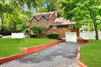 Discover this charming Split Colonial in Melvilleâ€™s beautiful Rollingwood neighborhood. With 4 bedrooms (plus a possible 5th) and 2 updated full bathrooms, this home blends modern comfort with classic style. The inviting living room features a cozy fireplace and sliding glass doors to the patio, while the dining room offers easy indoor-outdoor flow. Plenty of storage, including a large attic, adds to the convenience.Situated on a spacious 1/3-acre corner lot with mature trees, this home offers gas cooking, a newly fenced yard, renovated kitchen, new flooring, updated windows, new hot water tank, and gas heat. Donâ€™t miss the chance to make this lovely home yours!
