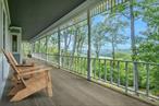 Perched high above its surroundings set on 15 expansive acres, this custom-built home offers rare privacy with unmatched views. Sited to take full advantage of its elevation, the stunning wrap around deck looks out to the reservoir with vistas that shift beautifully through the seasons. Just 50 miles from NYC and 10 minutes to metro north, it&rsquo;s an ideal option for city buyers seeking a weekend refuge or a full-time escape without sacrificing convenience. Step inside to find an airy, light-filled living space with hardwood floors, high ceilings, and a flexible layout. An eat in kitchen, living room, family room, first-floor primary suite which offers an en suite office and access to the wrap around porch. Upstairs, youâ€™ll find three additional bedrooms along with an open family room perfect for movie nights, playroom, or a cozy second living area. Versatile space on the third floor with access to the widows peak and balcony for a sky high view. Accessed by a long approach, the setting is unforgettable and the possibilities are endless, 25 Lake Gilead offers the kind of land, light, and quiet that simply can&rsquo;t be recreated.