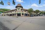 Once in a lifetime opportunity to own the most recognizable and substantial building in all of Suffern, NY. The KOMESKY BUILDING sits comfortably on 0.91 acres of prime downtown real estate and enjoys unobstructed views of the Ramapo Mountains. This landmark building was built in 1916 and stretches along Lafayette Avenue and Orange Avenue. It consists of over 42, 000 SF and includes 14 residential apartments, 3 live-work lofts, and 14 commercial spaces. There is an attached, private parking lot that maintains 39 lined parking spots and additional parking is located directly across the street in the municipal lot. Downtown Suffern also allows on-street parking for its patrons. The entire roof was recently redone. The commercial units are separately metered for gas, electric and water. The residential units are separately metered for gas and electric. Each commercial space has a usable basement directly below the unit, and all the units are incredibly well maintained. The building is 100% occupied. Although there are no formal leases in place, many of the Tenants are long term (more than 10 years, some more than 20). This is part of a portfolio sale that is concentrated in downtown Suffern, but this building and 24 Lafayette Avenue must be sold as a package. There is only one building that separates them.This building is directly across from Suffern&rsquo;s bus station where local and NYC routes are available. It is also 2 blocks from the Suffern train station.