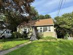 Fully renovated cape cod home in the heart of Spring valley. Brand new eat in kitchen with granite counters and SS appliances,  living room, 4 bedrooms and a full bath on the main floor. Two more bedrooms and a full bath upstairs. Two more finished rooms in the basement, plus additional laundry/storage area in the walk out basement. Large fenced in backyard and plentiful parking. Close to shopping, schools and transportation.