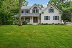 Welcome to this beautifully updated Post Modern Colonial nestled on a cul-de-sac in the heart of St. James. This home features an impressive 2-story entry foyer, a stunning center island eat-in kitchen renovated in 2019 with quartz countertops and stainless steel appliances, with an open concept family room including a natural gas fireplace and stacked stone facade. The formal living and dining room provide elegant entertaining spaces, while hardwood floors flow throughout the first floor & bedrooms. Upstairs, you will notice the open and airy landing providing access to the bedrooms. The spacious primary bedroom suite offers a luxurious ensuite bath renovated in 2019, walk-in closet, and a bonus room perfect for a home office, sitting room, or what you so fancy! Set on a flat .50 acre with a new vinyl-fenced yard, enjoy outdoor living on the paver patio with hot tub. Additional highlights include Andersen windows, vinyl siding, roof (approx. 10 yrs young), 2-zone gas heating (2022), separate hot water heater (2021), inground sprinklers (2023), a 200 AMP electric service and a generator hook-up. Located just moments from beaches, parks, local shopping, restaurants and the LIRR, in the Smithtown Central School District.