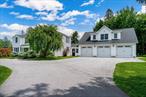 Stunning and exceptional Center Hall Colonial located in the lovely Flower Hill neighborhood! From the moment you step inside, youâ€™ll feel the warmth, charm, and elegance this beautifully updated home has to offer. Featuring classic architectural details and character throughout, this home is truly one of a kind. The gourmet kitchen boasts high-end stainless steel appliances, a Viking stove, beautiful cabinetry. The formal living room features a wood-burning fireplace, and the main level also includes a spacious family room just off the kitchen, with french doors that lead to a large, covered patio overlooking the level backyardâ€”perfect for entertaining or relaxing. Upstairs, the luxurious primary suite offers a generous sitting area, updated en-suite bath, and a walk-in cedar closet. With additional bedrooms, a full bath, and a potential home office, that will complete the second floor. The property also features a detached three-car garage with an impressive accessory apartment above. This beautifully designed space includes a fully updated kitchen with center island, expansive cabinetry, and an open-concept great roomâ€”ideal for guests, in-laws, or potential rental income. The garage also includes a workshop and additional storage space with endless possibilities. Set on a gorgeous, park-like property graced by a grand circular driveway, this home is centrally located near hospitals, colleges, Route 9, shopping, and all local amenities. A rare findâ€”offering space, versatility, and timeless beauty in a premier location.