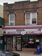Commercial Brick Building with Mixed-Use located in busy traffic on Jamaica Avenue. This Mixed-Used First Floor has Beauty Parlor and Nails with finished - full Basement and Second Floor featuring two separate apartments, . Building is also featuring New Roof, Windows, Boiler. The building is generating income to take care of itself. Building is close to Busy Traffic location, Public Transportation, Parks, School and Long Island Rail Road,  A few minutes walk to Hillside Avenue or a few minutes drive to Francis Lewis Blvd, Springfield Blvd, Grand Central Parkway.