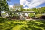 This one is for the car enthusiast and hobby farmer. Welcome to this well-maintained two-bedroom raised ranch, featuring numerous updates and exceptional amenities. Enjoy peace of mind with a newer roof, insulated windows and doors, and vinyl siding that enhance energy efficiency and curb appeal. The home is equipped with central air, a new air conditioner and handler, security system, and an automatic Generac generator for year-round comfort and safety. Inside, you&rsquo;ll find a spacious layout with a heated one-car garage under the house, perfect for everyday use. Recent upgrades include a 2024 oil tank and a new 1000-gallon concrete septic tank, ensuring long-term reliability. Step outside to relax or entertain on the low-maintenance Trex deck. Car enthusiasts and hobbyists will love the 31 x 36 ft free-standing heated garage, boasting three-plus car capacity, 11-foot ceilings, and a car liftâ€”ideal for projects or additional storage.Equestrians or hobby farmers will appreciate the two-horse stall barn and fenced pastures, providing ample space for animals and outdoor activities. Twelve minutes to the Taconic State Parkway and closer to the town of Pleasant Valley, shopping and schools.This property combines comfort, functionality, and versatilityâ€”all in one. A must-see for those seeking a move-in-ready home with room to grow. Lets make an offer today!