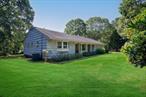 Westhampton Exclusive- South of Highway with Water Views!Situated down a long private drive on 1.06 acre, South of the Highway in Westhampton, this ranch borders over 4 acres of preserved land owned by the Town of Southampton. The 2, 300 sq. ft. home offers 3 bedrooms, 3 full bathrooms, living room, eat in kitchen, dining area and a spacious sun room. Additional amenities include easement to the water, basement, attached 2 car garage, central air conditioning, hardwood floors and room for swimming pool There is also an adjacent .35 acre parcel available for sale. Enjoy tranquil water views and the serenity of nature just minutes from the Village of Westhampton Beach.