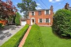 Welcome to 23 Westmoreland Drive â€“ a beautifully maintained brick Colonial on an oversized lot in desirable Beverly Crest. This thoughtfully updated home features 3 bedrooms, 3.5 baths with additional square footage beyond legal specifications, offering exceptional value and space. Recent updates include a modern kitchen with granite countertops and stainless steel appliances, new windows throughout, and solar panels for energy efficiency. The inviting layout flows from a classic living room with wood-burning fireplace to formal dining area, and bonus room currently used as playroom leading out to a charming and private upper patio. Upstairs bedrooms are filled with natural light and serviced by a modern hall bath with elegant finishes. The primary with en-suite incorporates the large semicircular windows for architectural charm. A finished lower level provides valuable additional living space as perfect bonus space or recreation room with spacious laundry room and access to the yard. The expansive private backyard is fully fenced and maximizes the oversized lot for outdoor living and entertaining. Perfectly positioned on a quiet, tree-lined street with close proximity to shops, parks, highways, and public transit, this rare blend of character, modern updates, generous space, and prime location makes 23 Westmoreland Drive an exceptional Yonkers opportunity.Two smaller bedrooms were made from one larger bedroom, legally 3 bed. DOB has 3 bedrooms on 2nd floor but lives like 4 bedrooms. Seller makes no representations.