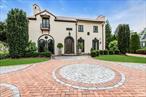 Welcome to 259 Lakeview Avenue W, a breathtaking Spanish Revival residence set on an expansive 0.80-acre lot in the coveted Village of Brightwaters. This impeccably updated and remodeled estate seamlessly blends timeless elegance with modern luxury, offering over 7, 700 square feet of refined living space across three levels.Step inside to discover 17 grand rooms, including 8 spacious bedrooms and 5.55 beautifully appointed bathrooms. The home boasts a chefâ€™s kitchen, adorned with custom woodwork, stainless steel appliances, and an open layout perfect for entertaining. Rich hardwood and tile floors run throughout, complemented by exquisite crown molding, high ceilings, and original architectural details.The main level features a formal living room, formal dining room, den, great room, butlerâ€™s pantry, mudroom, laundry room, and an elegant foyer. The second floor hosts the luxurious primary suite with a private deck, spa-like en suite bath, and multiple additional bedrooms, including guest quarters and an office. A full basement offers generous storage and utilities.Outside, enjoy a private resort-style oasis with multiple patios, a gazebo, and a stunning tiled and gunite gas heated saltwater pool and spa and gazebo. The gated property also includes a circular driveway, oversized private garage, and beautifully landscaped grounds with mature plantings and sprinkler systems.Located in the highly regarded Bay Shore School District and just minutes from beaches, golf, and dining, this is truly a rare opportunity to own one of Brightwatersâ€™ most iconic homes. Village amenities include, docking, tennis, beach, parks, trash removal and code enforcement.
