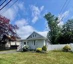 Nice cape offers 3 bdrm, office, 1.5 bth , dining room, livingroom with built in electric fplc, 1.5 detached garage with newer roof, New gutters and soffits 2023.
