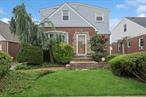 Expanded Cape in Franklin Square with 1, 900 Sq Ft of Living Space. Beautifully landscaped with great curb appeal, this spacious home offers 4 bedrooms, 2 full bathrooms, with lots of natural light throughout. The first floor features a living room/dining area, eat-in kitchen, 2 bedrooms, and a full bathroom with access to the full basement. The second floor offers an additional living room, eat-in kitchen, 2 bedrooms, and a full bathroomâ€”ideal setup for a possible mother/daughter with proper permits.