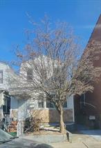 Great location. Great detached Home , with 3 bedrooms and a full bath on the 2nd floor. On the1st floor enclosed porch big living room,  formal dining room and 1/2 bathroom an efficient 2 window, double sink kitchen . Full finished basement with 1/2 bath and exit door to yard. Nice backyard but No Garage. Close to transportation, highways, Astoria & Northern Blvd shopping, LaGuardia Airport and CitiField. and so much more.!