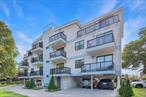 Welcome to this beautifully customized 2-bedroom, 1-bathroom condo in a well-maintained elevator building, ideally located in the heart of Sheepshead Bay. Every detail of this home was thoughtfully upgraded just a few years ago, creating a perfect balance of style and functionality.The layout features oversized custom closets, a fully renovated kitchen with premium finishes, and a sleek, modern bathroom. Additional highlights include energy-efficient split units in every room, heated floors, and a tankless water heater for on-demand comfort. The unit also features in-unit washer and dryer hook-up, offering added convenience.Enjoy seamless indoor-outdoor living with two expansive private balconies, ideal for morning coffee or evening relaxation. The home also includes a private parking space large enough to accommodate two vehicles, a rare amenity in the area.Located close to public transportation, major highways, shopping, parks, schools, and neighborhood entertainment, this condo offers the best of Brooklyn living in a quiet residential setting.