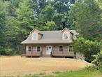 NEW BUILD IN PINE BUSH! Looking for peace, space, and quality construction? This beautifully crafted cape sits on over 2 acres and has everything you need to feel right at home. Whether you are looking for a weekend getaway or full-time residence, this house has it all. Inside, youâ€™ll find beautiful 5-inch solid oak floors in the main living area and upstairs hallway. The open concept main floor is bright and spacious. Beautiful kitchen with granite countertops and center island. The main floor has a primary bedroom with beautiful en-suite and the hallways has a half bath and laundry area. Enjoy relaxing on the low-maintenance TREX rocking chair front porch, rear deck and screened in porch perfect for those warm summer nights. Upstairs has two large bedrooms with ample side storage and full tile bathroom. Other highlights include a full basement with ingress/egress windows for future finished space and two car garage. This lovely home has propane heat, central air and on-demand hot water for energy efficiency and comfort. Thereâ€™s plenty of space to spread out, grow a garden, or just enjoy the quiet country vibe. This is the kind of home thatâ€™s built to last by a long-time reputable builder and ready for your finishing touches. Come check it outâ€”youâ€™ll love the space, the setting, and the possibilities! Minutes to Mohonk and Minnewaska State Park, New Paltz, Grassland Wildlife Refuge, Tillson Lake, area wine trails, rail trails and restaurants with local fare.