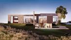 Crestline is a visionary to-be-built residence with 6, 216 finished square feet of meticulously designed living space, including three bedroom suites and four-and-a-half luxurious baths. Perched atop a 41-acre hilltop with commanding 360-degree views of the Catskills, Stissing Mountain, and the rolling agricultural valleys below, this architectural masterpiece harmonizes with its natural surroundings. Located minutes from Rhinebeck and Red Hook, known for boutique shopping and farm-to-table dining, Crestline offers effortless access to the Taconic State Parkway, putting New York City just 90 minutes away. Surrounded by farmland that enhances privacy and openness, the property also enjoys proximity to hiking trails, antique markets, and the many recreational offerings of the Hudson River Valley. The homeâ€™s architecture unfolds in two distinct volumes, joined by a soaring triple-height glass foyer. The west-facing pavilion, a glass-wrapped structure that appears to float above the land, houses open-plan social spaces and showcases breathtaking views of the Catskills. Inside, 13-foot ceilings and floor-to-ceiling windows flood the living room, gourmet kitchen, dining area, and library with natural light. A fluted-glass and steel partition subtly separates the kitchen from the formal dining area, while a dual-sided fireplace adds warmth between dining and great room. The library, offering panoramic views over the pool and landscape, provides a tranquil retreat for reading or remote work. Below this pavilion, inset into the slope, is a lower-level lounge and a separate pool house with full bath and sauna. The eastern volume, a grounded stone and wood structure, contains the private living quarters. On the main level, a generous screening room and serene primary suite offer comfort and privacy. The suite includes a spa-like bath, dual walk-in closets, a fireplace, and access to a secluded terrace. Upstairs, a cozy family room and two spacious bedrooms, each with ensuite baths and walk-in closets, create a quiet retreat. Outdoor living is fully integrated into the design. Off the foyer and great room, a hardscaped kitchen and dining terrace with retractable shade structures provides the ideal setting for alfresco entertaining. The west-facing pool deck steps gracefully down the slope and aligns with the lower lounge and pool house. This expansive tiled patio includes shaded seating with a fireplace and sun-drenched lounging areas. The primary suite opens to its own terrace, while two rooftop gardens offer additional outdoor escapes with sweeping views. Two hand-laid stone feature walls define the architectural experience, serving both structural and aesthetic roles. These monumental walls weave indoors and out, anchoring fireplaces, the outdoor kitchen, and wet bar, while creating a seamless connection between home and landscape. At the entry, they form a stone-lined vestibule, setting the stage for a dramatic reveal. A floating steel, wood, and glass staircase rises through the triple-height foyer beneath a skylight that pours daylight onto the stone. Interior finishes reflect a modern yet grounded sensibility. Rough-hewn stone contrasts with clean lines and refined materials: wide-plank oak floors, rift-cut walnut cabinetry, quartzite countertops, marble bath tiles, and burnished brass accents. The exterior, finished in glass curtain wall, anodized bronze, and sustainable Accoya wood, embodies durable elegance. Crestline is powered entirely by electricity. A geothermal system, triple-pane windows, high-grade insulation, and energy-efficient appliances ensure sustainability. From quiet evenings in the library to weekend gatherings around the pool, Crestline offers the rare combination of high design, immersive views, and a lifestyle rooted in privacy and connection. This is not just a home - it&rsquo;s a retreat where architecture and nature exist in perfect harmony.