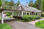 Dreaming of owning a Storybook Cottage then make this one yours at 22 Turtle Cove Drive, nestled in the charming Southampton Shores, where fond memories are waiting to be made. This Retro 1945 cottage boasts three bedrooms plus den and two bathrooms, providing ample space for relaxation and comfort. Step into the light-filled sunroom, where sunshine pours in through expansive windows, creating a cheerful and bright space. The versatile den offers the potential for an additional main level bedroom, perfect for accommodating guests or for use as a home office. The heart of this home is the cozy living room, adorned with a heartwarming fireplace, where you can enjoy warm evenings with loved ones. Outside, a slate patio beckons for alfresco dining and outdoor entertainment, while the detached garage provides additional storage or workspace. The community of Southampton Shores is a treasure trove of amenities. Enjoy a friendly match at the community tennis courts or embark on a boating adventure from the community marina. The beachfront community is a delight for all, with a sandy beach just a short stroll away. Sports enthusiasts will appreciate the baseball field and basketball court, perfect for friendly games and community tournaments. 22 Turtle Cove Drive is more than just a house. It&rsquo;s a place where you can create cherished memories, enjoy community camaraderie, and experience the tranquility of coastal living. Come and see the potential this home has to offer.