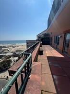 PRICE IMPROVEMENT - PRICED TO SELL!!!Experience the best of beachside living in this beautifully renovated 2-bedroom, 2-bathroom condo at the sought-after Ocean Grande in the Rockaways. This bright and spacious home features brand-new, never-used stainless steel appliances and an enormous private balcony with breathtaking, unobstructed ocean views. The open layout offers balcony access from both bedrooms as well as the living room, filling the space with natural light throughout the day. The primary bedroom includes a walk-in closet and its own en suite bathroom, offering a private retreat within the home. Included with the unit is a deeded parking space (#39), adding valuable convenience to your daily life. Ocean Grande is a meticulously maintained building with exceptional amenities including direct beach access with locker rooms and showers, a fully equipped gym, a common laundry room, party room, busines center, a 24-hour doorman, and a live-in superintendent. Whether you&rsquo;re looking for a year-round residence or a relaxing getaway, this is easy, elevated beach living at its finest.