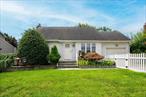 Spacious Cape with Village location under $550K !!!! Updated kitchen , bath , gas heat and central air!!!! Finished basement and 1 car attached garage. Full house generator means you will never lose power. Fully fenced yard with Koi pond and shed. Quiet one way street. Taxes with Village and basic star are under $8100!!!!
