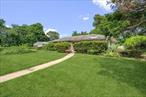 Over half an acre property with 175 Feet of Frontage. Handy man special, sold completely as is. No Representations.