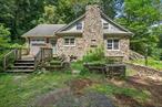 Storybook charmer brimming with potential!!  Solid 1940s Cape Cod, set on a generous 1.4 acre lot, offers original hardwoods, a timeless stone facade and room to dreamâ€”whether you envision a cozy homestead or a modern refresh.  Features include an eat-in kitchen, a cozy living room with stone fireplace and built-in cabinet, a large entryway, two bedrooms and full bath on first floor. Second floor boasts a large primary, an additional bedroom and spacious bath. Plenty of closets and storage throughout. Full unfinished walk-out basement, with laundry area.  Front porch, small deck and stone patio. Horseshoe driveway enhances accessibility. Close to the quaint Village of Montgomery, major highways and shopping. Valley Central Schools. A rare chance to bring vision and value to a classic!!