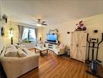 Welcome to this oversized and sun-drenched 1-bedroom condo in the highly desirable Garden Bay Condominiums of Astoria Heights, Queens. Situated on the top floor of a charming pre-war building, this rare corner unit offers approximately 900 square ft of thoughtfully laid-out living space with great flow and timeless character.An open foyer welcomes you into the home, leading to a large, light-filled living room and a spacious formal dining areaâ€”perfect for entertaining or creating a stylish home office setup. The layout flows seamlessly from room to room, creating a bright, airy atmosphere throughout.Original hardwood floors, high ceilings, and multiple exposures bring warmth and charm to every corner. The king-sized bedroom offers peace and privacy, while the generous proportions of each room provide flexibility and comfort not often found in a one-bedroom home.Nestled in a well-maintained, beautifully landscaped complex, this top-floor unit combines classic details with modern livabilityâ€”just minutes from Astoriaâ€™s vibrant dining scene, parks, and easy access to Manhattan.This is a rare opportunity to own a spacious, top-floor residence in one of Queensâ€™ most coveted communities.