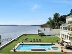 Inspirational! The Landing... The ultimate in luxury, waterfront living on the Hudson River and only 35 minutes to Manhattan! A 4, 800sf home with a wall of glass facing the water from multiple levels and there&rsquo;s an elevator to all floors! This property offers it all: an inground pool with spa, a long dock with a rocky/sandy beach, and a freestanding 400sf studio building. Every system, window, door, flooring, wall, kitchen and baths have been dramatically replaced with a modern floorplan, with large open spaces laid out over 4 to 5 levels. And of course, all of the mechanicals are like new too. The Landing is a great weekend home or full-time residence. And it&rsquo;s turnkey! No aggravation or work to do! Originally built in 1860 as a Queen Anne Victorian, it was known as the Coles Mansion. The home maintains its original architectural design from its exterior on the road/west side but offers a totally reimagined interior and exterior on the east side (sunrise side) for 21st century waterfront living. In 1891 the home&rsquo;s entire rear property was rebuilt, leveled and built up as a beautiful flat lawn and garden. Its bulkhead design has been supported through the years and safely protects the home from mother nature&rsquo;s surprises. In about 2015, the current owners worked with their architect and designers to create a home for a modern lifestyle with luxurious finishes, and with multiple windows and glass doors, to see the Hudson River from almost every room. The home features numerous amenities, such as state-of-art kitchen, with a built-in seating alcove facing the river; multiple bar stool seating too from the long counter; double Sub-Zeros refrigerators, 6 burner Wolf cook top with griddle, Miele double ovens, coffee station and dishwashers. The second kitchen on entertainment level offers 2 Sub Zeros (1 full size wine fridge), induction cooktop, and Cabana area that functions as another kitchen and entertaining area outdoors and opens out to the pool and patio space in the rear yard. It also features a basketball area. The primary bath includes a steam shower and soaking tub. Onyx powder room. Marble floors with radiant heat throughout the first level. Stylish 8ft walnut wood doors with stainless steel inserts throughout gives a modern, midcentury vibe to the house. Stone counters, textured walls, and tray ceilings with recessed lighting. Other finishes include Venetian plaster, rice paper, stone and metal tile work, fireplace in living room and fire pits outdoors. Even the garage was modernized to accommodate 3 cars and offers 2 charging ports for electric cars. Its translucent glass doors provide an abundance of light at almost any time of day. The Landing is conveniently located between Piermont and Nyack, and its many shops, restaurants and marinas - only a nice walk away or very short drive. The Tarrytown train goes to Grand Central - only a 12-minute drive, and the bus to Midtown stops in front of the house! Nothing Compares to The Landing!