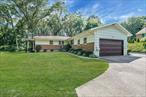 Welcome to this 3-bedroom, 3-bath Ranch located in the Town of Huntington, within the highly regarded Half Hollow Hills School District. Set on 1.37 acres of private, park-like grounds, this property offers the ideal blend of open space and natural beauty.The level backyard features lush, well-maintained grass, mature trees that offer a mix of shade and filtered sunlight, and a serene atmosphere perfect for relaxing, entertaining, or outdoor activities. Whether you envision a garden, patio, or a pool (with proper permits), this expansive lot provides a versatile canvas for future enhancements.Inside, the home features a spacious kitchen with sliders leading to the deck, a formal dining area, and a large living room with a striking stone fireplace as the centerpiece. A full basement offers additional living space and, with proper permits, may be suitable for an accessory apartment or mother/daughter-style layout.Additional highlights include a two-car garage and a peaceful setting in one of Dix Hillsâ€™ most desirable areas. While the home needs some TLC, itâ€™s a rare opportunity to bring your vision to life on a truly special piece of property. Sold â€œas is.â€