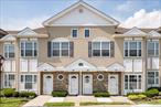 Step into Comfort, Convenience and Community with this beautifully maintained condo at The Seasons of East Meadow which is an over -55 Complex with 24 hour security. Whether you are looking to downsize, simplify or enjoy a low maintenance lifestyle this community is the place to call home! This Upper Unit with a Private Elevator is tucked into one of the best spots in the complex.....a perfect blend of access and privacy. The Condo features an open floor plan with vaulted ceilings. Living Room, Dining Room and Kitchen with stainless steel appliances (refrigerator replaced in 2023) and hardwood flooring throughout. There is a king-sized primary bedroom with ensuite and second bedroom with access to a private trex deck (redone in 2023).  Versatile Loft area (with chairlift ) which can be utilized as a guest bedroom/office space or Den. The Hotwater heater was replaced in 2022 and the a/c and heating system was updated in 2021. Come and enjoy the many amenities the Seasons has to offer........Indoor and Outdoor pools, Spa, Library, Fitness Center, Movie Theater and Card Room.  Conveniently located near Shopping, Restaurants, Parks and all transportation.