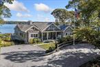 Facing due east with panoramic views and brilliant sunrises with 101&rsquo; water frontage on Three Mile Harbor, this traditional house was thoroughly renovated in 2022. The upside-down configuration is approximately 3, 500 square feet and each floor can operate separate from one another. The main floor has a 23&rsquo; vaulted ceiling that creates a dramatic space for the living room with fireplace, wet bar with wine refrigerator, dining area and designer kitchen with island, double sinks, dishwashers and generous walk-in pantry. There are 5 bedrooms with 10&rsquo; tray ceilings and 4.5 baths, two ensuite wings on the main floor, bedroom with private entrance and a separate private office with pocket door. The lower level hosts a living area with fireplace, kitchenette including sink, dishwasher and refrigerator, two ensuite bedrooms, miscellaneous room with shelving and a large mirror, laundry, massive amounts of storage and double doors leading to the water access. Additional amenities include a Kohler generator, solar panels, electric car charger, county water and Self- Contained Hydro Action AN600 waste treatment system. The house sits 50 feet from the shoreline and 13 feet above sea level setting up the best in your face preexisting view of them all. This is the home of the late Hamptons Wellness Foundation creator who was also a life coach and avid sportsman. Beautifully designed, built and sited on 0.54 acre, the house is insulated from traffic noise because of the cul-de-sac location.