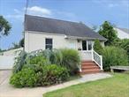 Spacious 3 bedroom 2 bath cape in the village of Lindenhurst. This has a nice large kitchen and dining room with sliding doors going out to a deck. This has a large detached garage. This is a must see, great opportunity. The village taxes are $1266.52
