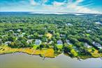 Prime Quogue Village Land with Approved Plans for Luxury New Construction! Set on 1.29 acres in the heart of Quogue Village, this exceptional parcel offers the rare opportunity to build a brand-new residence just one mile from Quogueâ€™s shops and dining, and only 2.5 miles from the beach. Approved plans call for an approximately 6, 500 sq. ft. Hamptons-style home featuring 8 bedrooms, a custom chefâ€™s kitchen, open-concept living, soaring ceilings, and refined architectural details throughout. The thoughtfully designed layout includes a junior master suite on the first floor, a spacious upstairs master suite with dual walk-in closets and spa bath, plus a finished lower level with additional bedrooms and recreation space. Outdoor plans feature a 20&rsquo; x 40&rsquo; heated saltwater gunite pool. Pool house and tennis or pickleball court are also optional. This is a rare chance to secure land in a premier location with a fully envisioned, high-end build ready to come to life.