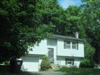 Commuters Dream! Great starter or down sizer! This 2 Bedroom, 1.5 Bathroom Raised Ranch in The Village of Maybrook offers hardwood flooring, spacious kitchen with plenty of cabinet & counter space, family room on lower level, & 3 season room. Level yard & 1 car garage. Walk to the Village Of Maybrook. Minutes to I-84, I-87, shopping, schools and amenities. Sold as-is.