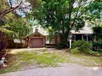 This unique waterfront Cape-style home in a prime Freeport cul-de-sac offers 2 bedrooms, 2 baths, and direct canal access to the Jones Inlet, with 185 ft of updated private bulkheadâ€”perfect for boats and water sports. Recent updates include a new roof. Inside, the home features inviting brick floors throughout the entry and living room, two fireplaces, one in the main bedroom and a stunning stone wood-burning fireplace in the living room. A charming and bright eat in kitchen boasts an atrium style sunroof, Large windows, and a walk-in pantry. The living room area has built in shelves and wall to wall windows that will provide tons of light and back yard water views, built-in shelves and a magnificent stone wood-burning fireplace. Additional first floor highlights include a sun room, garden room, attached garage, and an expansive deck/patio ideal for outdoor entertaining â€”ready for a modern transformation. With thoughtful restoration, this home has the potential to become a luxurious waterfront retreat, offering both style and functionality in one of the most desirable locations. Enjoy enhanced privacy with, just moments from Freeportâ€™s Nautical Mile. A rare opportunity to create a true luxury gem!Ask ChatGPT