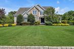 Offered to new residents for the first time, this young post-modern Colonialâ€”constructed in 2003â€”is set within one of Wading Riverâ€™s most desirable subdivisions, surrounded by equally beautiful homes. Well maintained and tastefully & thoughtfully updated, it presents a true move-in ready opportunity within Shoreham-Wading River school district. The home welcomes you with an architecturally interesting double height foyer trimmed with custom millwork. Flanking the entry, one will find a first floor study (optional 5th bedroom) to the left, and a formal living room that seamlessly transitions into a formal dining room, to the right. Crown molding, wainscoting, rich hardwood floors, and oversized bay windows enhance these spaces, which are perfectly suited for hosting gatherings. At the heart of the home, the chefâ€™s kitchen features solid maple cabinetry, granite countertops, updated stainless steel appliances - including a gas range - and a functional layout ideal for everyday living and entertaining alike. The adjacent family room offers lofty 20 foot ceilings, four oversized windows, and a focal-point gas fireplace, as well as a Juliet balcony set above. Upstairs, a double-door entry leads to a generously proportioned primary suite complete with a spacious walk-in dressing room, and an ensuite offering dual vanities, a soaking tub with views over the backyard, and a separate water closet. Three additional bedrooms, one with a walk-in closet, along with a full hall bath and convenient second-floor laundry, round out the upper level. The finished lower level is simply awesome, offering 10-foot ceilings and a lounge-inspired design. Highlights include a wet bar with seating for six comfortably, multiple beverage refrigerators, a built-in wine rack, a dedicated billiards area, and a high-end theater room for immersive movie nights (details upon request). Outdoors, over 0.8 acres of level, manicured grounds stand as an extension of your interior living space. An extensive herringbone paver patio offers three distinct entertaining areas, including a gazebo-covered poolside lounge. The custom oversized L-shaped pool features three sheer descent waterfalls and is surrounded by lush landscaping. A lighted sports court and expansive lawn offer additional space for recreation. Other noteworthy points include a two car side entry garage, natural gas heating, and a brand new hot water heater. Located within the acclaimed Shoreham-Wading River School District and part of the Township of Riverhead, this property stands in close proximity to north shore beaches on the Long Island Sound, Wading Riverâ€™s Wildwood State Park, and Long Islandâ€™s North Forkâ€¦think vineyards, beaches, farms, and coastal towns that define the best of the East End lifestyle.