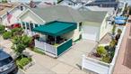 Welcome to your perfect coastal retreat in the highly desirable Walks section of Westholme! This charming south-facing Beachside Bungalow offers the best of relaxed seaside living with unbeatable proximity to Long Beachâ€™s iconic Boardwalk and pristine beaches.Featuring 2 spacious bedrooms and 1 full updated bathroom, this home is thoughtfully designed for comfort and easy living. Enjoy a bright sunroom that opens to an enclosed summer/fall patioâ€”ideal for morning coffee or evening gatherings. An outdoor shower makes beach days even better, while the mature garden of sets the home beautifully.Modern amenities include central air and a high-efficiency HVAC system to keep you comfortable year-round. Parking is a breeze with a coveted driveway offering space for 2 cars plus an attached 1-car garageâ€”an absolute rarity in this sought-after area.Located just a stoneâ€™s throw from the bustling West End, youâ€™ll have effortless access to local cuisine, unique shops, and vibrant nightlife. Commuters will appreciate being close to the LIRR, all major parkways, and the center of town for ultimate convenience.Donâ€™t miss your chance to own this inviting beachside gem in one of Long Beachâ€™s most coveted neighborhoods.