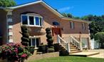 A must see. Magnificent, contemporary all-brick home on a quiet cul-de-sac in pristine condition. This spacious 2, 862 sq. ft. home includes four bedrooms and four full baths, with one bedroom on the ground level that can serve as an office. Sunny and bright , 4 skylights. The well-appointed kitchen with granite countertops and a walk-in pantry flow seamlessly into the dining areas, with windows overlooking the majestic and private tree-lined landscape. Lounge in a sunlit, spacious den with walls of windows overlooking the in-ground pool in the backyard. Upstairs is a true owner&rsquo;s suite, a spacious primary bedroom with a Jacuzzi and walk-in shower in the en-suite bath, and a spacious walk-in closet with built-in drawers and a vanity area that overlooks the backyard. An additional two spacious bedrooms, one with a private bath in addition to the fourth full bath in the hallway ensures plenty of living space for family and guests alike. The two-car garage and storage shed in the backyard allow for plenty of storage space. The home is conveniently located with groceries, restaurants, hardware stores, the LIRR station, and destinations like beaches, parks, Sea Cliff, and downtown Glen Cove and Locust Valley all just minutes away!