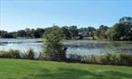 LAKE FRONT HOME ON A CUL DE SAC IS CALLING YOU ..THIS EXANDED RANCH OFFERS 3 BEDROOMS, 2 FULL BATHROOMS, PRIMARY BEDROOM WITH BATH, WOOD BURNING FIREPLACE ..CENTRAL AC, SOLAR OWNED , HARDWOOD FLOORS ,  68 OF LAKE FRONT OF THE TRANQUIL WEST LAKE..PRIVATE ENTRANCE TO OTHER SIDE OFFERS 1 BEDROOM 1 FULL BATHROOM SPLIT AC AND A FIREPLACE.... W PROPER PERMIT LEGAL ACC APARTMENT . HOUSE IS UPDATED 4 YEARS AGO.. UNFINISHED BASEMENT OFFERS TONS OF STORAGE AND LAUNDRY AREA.IT WONT LAST LONG !!!