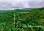 The moment you have been waiting for: Nestled in the mountains of Kerhonkson and neighboring the Vernooy Kill Falls, this prime building lot boasts 1.37 acres ready for you to declare your next homestead. Enjoy this hamlet of Palentown completely blank canvas offered here as this raw and undeveloped land is ready for its next owner. An old woods road near the right of the property line makes the perfect access for your future driveway and grants you access to build your dream home tucked into the mature trees, natural greenery and exposed rocky terrain. Right outside your front door you have endless opportunities to explore the mountains by being close to hiking and biking trails and natural waterfalls. This opportunity will not last long for your future country home you have always been dreaming of.