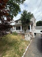 oversized single family located in the prime location of East Meadow. Wont last