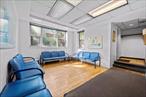 Discover this bright and versatile 1, 300 square foot first floor commercial space. Featuring seven private rooms, two bathrooms, and a full waiting area with a separate reception desk, this property offers a thoughtfully designed layout to support a variety of business needs. Large windows throughout flood the space with natural light, creating a welcoming and productive environment for clients and staff alike. Enjoy well maintained landscaping that enhances curb appeal and professionalism. Located in a high visibility area, the property is conveniently close to public transportation, parks, schools, and shopping, making it easily accessible for your clients and team. Monthly maintenance is $2, 085 and includes taxes heat and water. Donâ€™t miss this opportunity to establish your business in a bright, functional space in a thriving community.