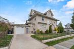 This beautifully maintained and updated three-family home has charm, character, and excellent curb appeal â€” making it an ideal opportunity for both savvy investors and owner-occupants. Located on a corner property lot of a tree-lined street, the home features three well-kept units: a 3-bedroom on the first floor, a 2-bedroom on the second, and a 1-bedroom on the top level. Each apartment has hardwood floors, oversized windows, generous living spaces, and functional layouts. The first-floor unit features a large living room, an eat-in kitchen, and three well-proportioned bedrooms. The second-floor unit mirrors much of the same charm, with bright living areas and two comfortable bedrooms. The third-floor unit is a one-bedroom retreat with dormered ceilings and a warm, private ambiance â€” perfect as a starter apartment or guest suite. All three units are occupied by respectful, long-term tenants on month-to-month leases, providing income stability and future flexibility. Whether youâ€™re seeking a strong investment property or a multi-generational living setup, this home offers a wide range of possibilities. Additional amenities include an attached garage, private driveway, common laundry, and ample basement storage for both tenant and owner use. Located close to shops, schools, restaurants, and public transportation, this turnkey property delivers a rare combination of lifestyle, location, and long-term value. Donâ€™t miss the chance to own a truly special multi-family home with a strong rental history, upside potential, and timeless appeal.