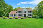 Turnkey Colonial with Style, Space & Curb Appeal! This updated 3, 400 sq ft Colonial sits on 1.2 private acres in one of Washingtonvilleâ€™s most sought-after neighborhoods. Nothing to do but move inâ€”youâ€™re welcomed by newly refinished wood floors on the main level, stairs, upstairs hallway and landing. Along with a freshly painted interior. The spacious family room features cathedral ceilings, a fireplace, and new French doors leading to a large deck overlooking the tranquil backyard. The kitchen offers a new stovetop, newer appliances, updated hardware, a new faucet, and a walk-in pantry with automatic lighting. All bedrooms are generously sized, and bathrooms are updatedâ€”primary bath features a brand-new shower and cathedral ceiling. Basement offers 1, 800+ sq ft with high ceilings and French doorsâ€”ready to be finished. New shutters, new driveway, power-washed exterior, newer roof (2019), boiler (2019), water heater & softener (2024). Located in Washingtonville Schools and close to shops, parks & commuter routes. Ask for full update sheet.