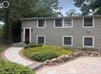 Welcome to Cul-de-sac Living adjacent to Setauket Greenway Trail, Nature lovers will love the direct access to the trail. Perfect for jogging, walking and biking right from your backyard! This beautiful high ranch is located in the heart of the sought after Three Village CSD. Step inside to discover 4 spacious bedrooms, 2 full baths, lower-level bath has been fully renovated, completed 12/2024 with a transferable lifetime warranty. The upper-level features rich wood flooring, while the lower level is finished in classic ceramic tile. Natural light pours through the three skylights located throughout the home (Foyer, Master bed & 2nd Fl bath). Along with a wood burning fireplace which adds charm to the main living area. Enjoy seamless indoor-outdoor living with sliding doors leading to a Cambridge paver backyard patio (less than 5yrs old) beautifully maintained, perfect for that morning coffee and of course entertaining. The Cambridge paver driveway, also less than 5yrs old, offers impressive curb appeal. This home is also equipped with 200-amp service, central A/C ready, with underground utility service, fiber optic cable and Anderson Windows (2013). This home offers comfort and convenience.  Don&rsquo;t miss out on your chance to own this home in an unbeatable location.