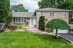 Welcome to this stunning brick-front expanded split-level home nestled in the prestigious Viceroy Estates of Massapequa. Designed for both comfort and sophistication, the open-concept layout showcases a formal living room with gas fireplace and vaulted ceilings, and seamless flow into dining room and expanded eat-in kitchen, both with doors to the custom deckingâ€”perfect for entertaining. The primary suite is a sanctuary of sophistication, complete with a spa-inspired shower bath, and custom walk-in-closet. Generously sized secondary bedrooms provide ample space, while a second-story balcony overlooks the showstopping backyard oasisâ€”custom decking with built-in seating and BBQ, a heated saltwater inground pool with an electric cover, a sunken patio, and lush, manicured landscapingâ€”ideal for unforgettable gatherings or peaceful escapes. Downstairs, the family room is the perfect spot to relax and unwind in style. This is the ultimate home for those who love to entertain and live beautifully.