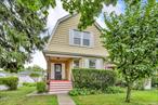 BRIGHT, CHARMING colonial with larger-than-usual backyard for this neighborhood. Consisting of 2 LOTS, the long driveway leads to a 2 car detached garage. A welcoming spacious FRONT PORCH leads into the foyer. Newly painted walls and immaculate hardwood flooring lines the living as well as dining room. Host memorable meals in the dining room featuring a decorative fireplace. The main and butler&rsquo;s kitchen render extra storage and working space for utensils as well as ingredients. The second floor contains 3 bedrooms and the full bath. Among recent improvements; architectural ROOF shingles for main house and garage (40 years life span; 2017), Electrical panel upgraded to 150 Amp; New front porch (2024); Newly finished hardwood floor (2025), New flooring in the kitchen (2025); New carpet staircase and second floor (2025); Extra railings on staircase ( 2025); New hot water tank (Rheem, 2024); Newly painted first and second floor. Additional space in the full walk-out basement excluded from square footage. The spacious backyard holds the potential to be transformed into a private oasis by the new owner. CLOSE to downtown New Rochelle, restaurants, Iona University, public library and Huguenot Park (Lake, gardens and playground). Convenient 10 minutes bus ride to the New Rochelle Metro North station.