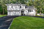 Discover this exceptional property in Smithtown Pinesâ€”spanning over 3/4 acre on a rare half-block lot directly across from a tranquil nature preserve. This beautifully remodeled 5-bedroom, 2.5-bath home seamlessly combines space, privacy & a new contemporary interior. It features oak hardwood floors, crown moldings, a formal entry hall & a sun-lit open-concept dining kitchen with quartz countertops, pantry, and stainless steel appliances. A Family room with fireplace & a three-season outdoor room are perfect for entertaining or playroom. The cathedral living room is ideal for additional relaxing space & formal dining. The primary suite offers a walk-in closet & private bath with beautiful barn door closure. Four additional oversized bedrooms are on the second floor with oversized hall bath. A private pool area completes the serenity of the backyard creating a summer oasis. There is a mudroom off the kitchen & two car garage with convenient circular driveway. For equestrian enthusiasts, the property allows up to two horses with direct trail access to Blydenburgh Parkâ€™s 627 acres of scenic trails, fishing, & recreational activities. With close proximity to shopping, transportation & major roadways, this home blends new finishes with an open concept interior & outdoor adventure right in your own backyard!