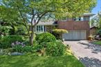 SYOSSET - Clearview Village, Syosset School District! This terrific, extensively expanded Brick Split Level home has 3/4 Bedrooms, 2/3 Bathrooms. It is perfectly situated in the heart of the neighborhood and features a bright, open floor plan! The 1st level features Entry Hall w/dramatic soaring ceiling and coat closet, Spacious Formal Living Room w/bay window and Expanded Formal Dining Room with cathedral ceiling and bay window, all with Hardwood floors. The expanded Eat-in Kitchen is the heart of the home and features cathedral ceiling, Gas cooking and double oven with lots of possibilities. The lower-level Family Room features 26&rsquo; x 10&rsquo;5 large addition with masonry Fireplace, cathedral ceiling, Andersen Windows and Skylights, lots of potential, including possible 4th bedroom or Room for Mom (needs flooring), New 1/2 Bath and entrance to 2 car garage. The 2nd level features Primary Bedroom Suite with rough-in plumbing for existing future Full bathroom and large walk-in closet. There are 2 additional spacious Bedrooms and Full Bathroom. The basement has Utility area, Storage areas and Laundry area with double sinks and a laundry chute from 2nd floor Main Bathroom. The lovely property is .19 acre with a wide lot and professionally landscaped with specimen plantings and Inground sprinklers. The terrific, fenced backyard features a spacious play area and lush gardens! Addl Updates and amenities include Architectural Roof, Gas Heating System/Baseboard and hot water heater, Central Air Conditioning as is, 200 Amp Electric Service, Underground Utilities, Skylights, Andersen Windows, Architectural moldings and Hardwood Floors, plus more! Baylis Elementary, HB Thompson Middle School, Syosset High!