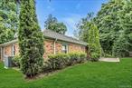 Expanded Ranch located in North Syosset Offering 4 Generous Size Bedrooms Including Primary Bedroom with Ensuite Full Bathroom, 3 Additional Bedrooms with Full Bathroom,  Living Room With FirePlace, Formal Dining Room, Den With FirePlace, Eat in kitchen, Full Basement with lots of possibilities,